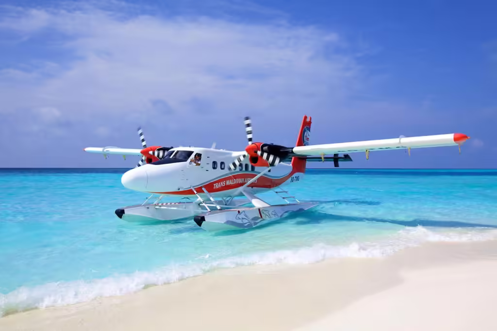 Trans Maldivian Airways at Maldives resort beach side 